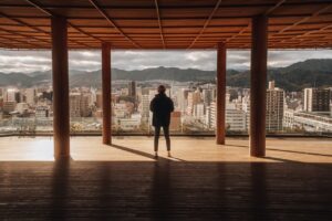 Performer on stage with a view of Tokyo, Japan